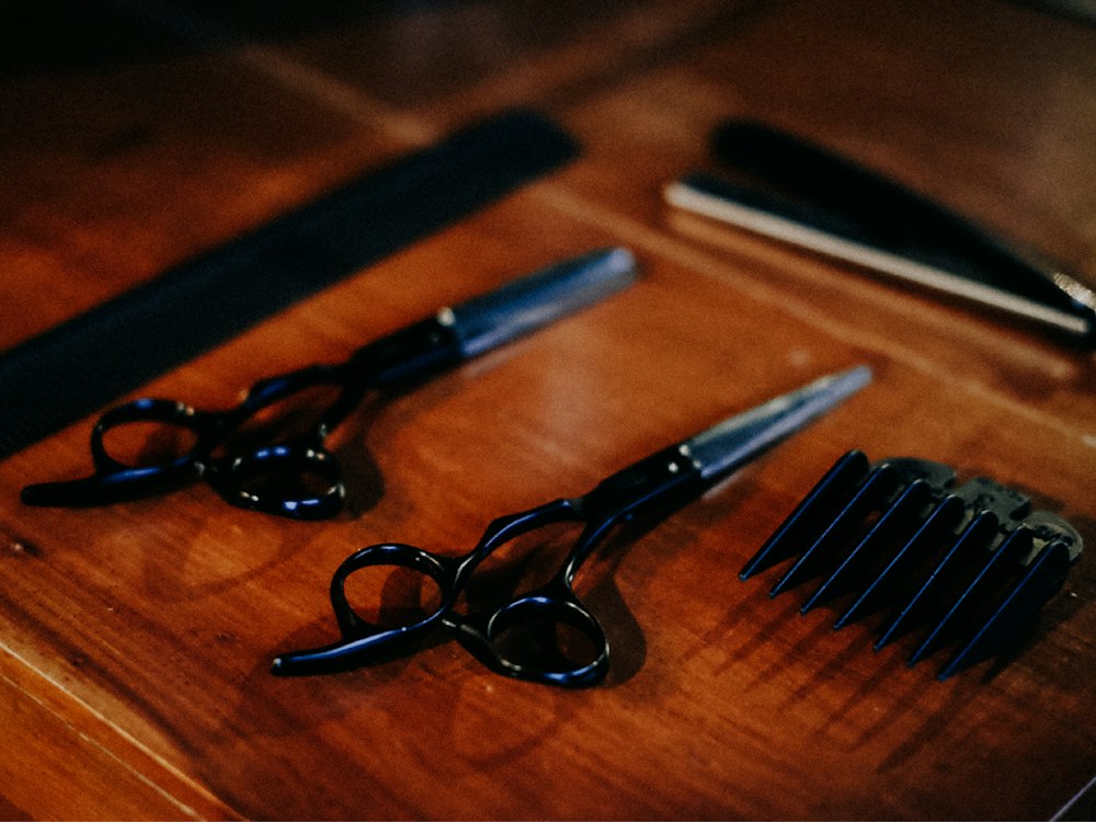Barber tools: scissors, comb, clippers and straight razor